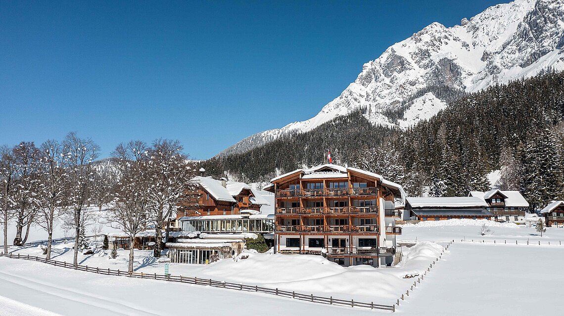 Ramsauhof in winter with a magnificent mountain panorama in the background
